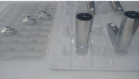 Trays for transport and protection of injected parts Image