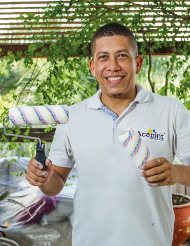 Paint brushes and paint rollers Image