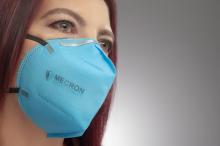  Disposable face mask for clinical use. Image