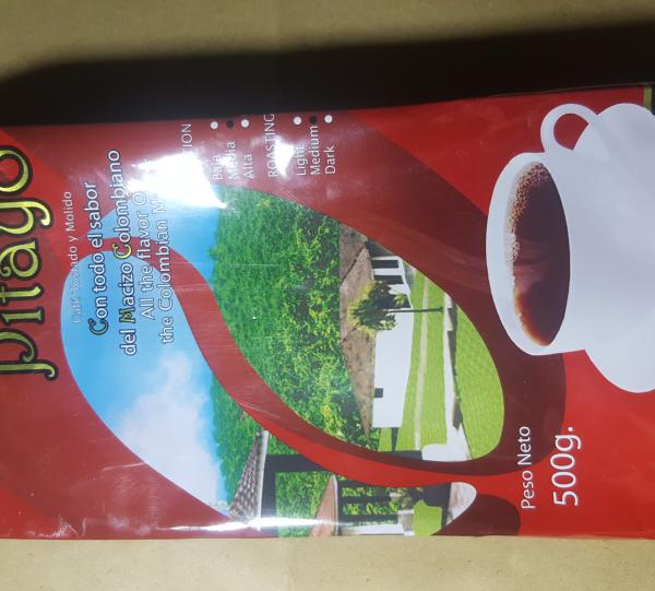 Roasted ground coffee or beans and olive green excelso coffee Image