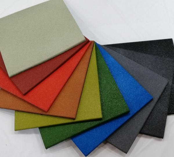 Modular tiles of different thicknesses and colors, made from rubber 100% from recycled tires (SBR) Image